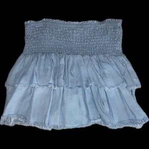 Blue skirt, soft material, size medium. Never worn, no tags attached